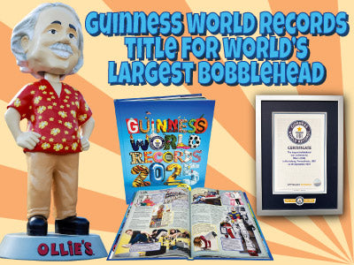 Guinness World Records title featuring Ollie's largest bobblehead, record book, and certificate.