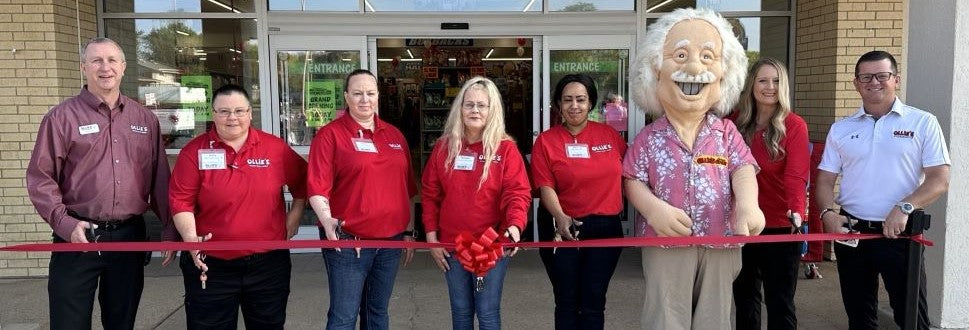 Photo of ollie's employees standing in front of a new store opening