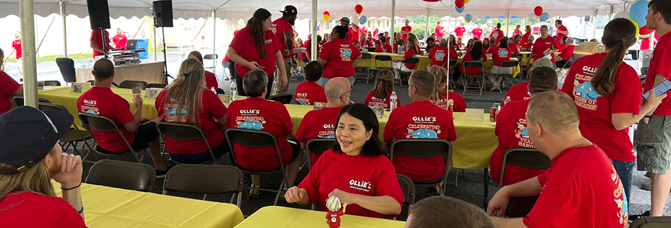 Photo of ollie's employees having fun at a corporate event